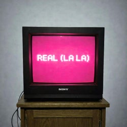 Real (La La)