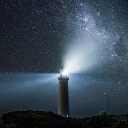 Lighthouse By Night