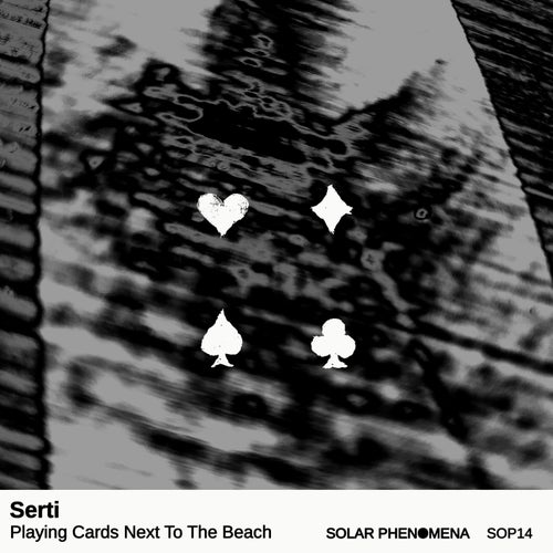 Playing Cards Next To The Beach